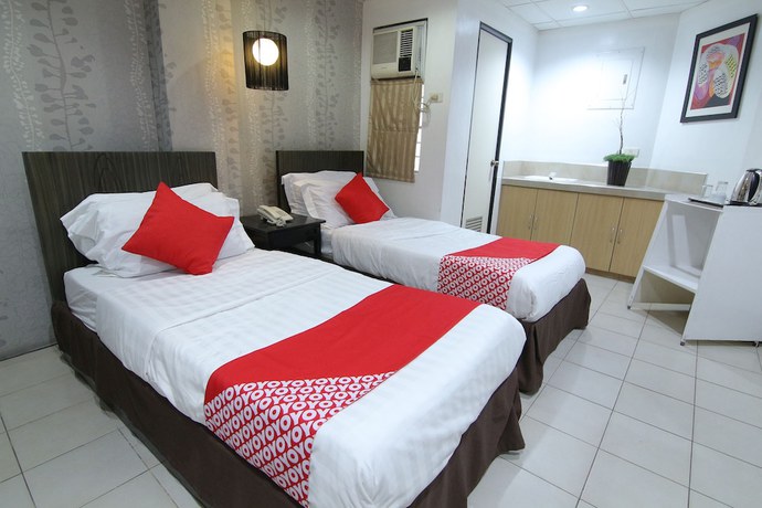 Imagen de la habitación del Hotel Super OYO 107 Orange Nest. Foto 4