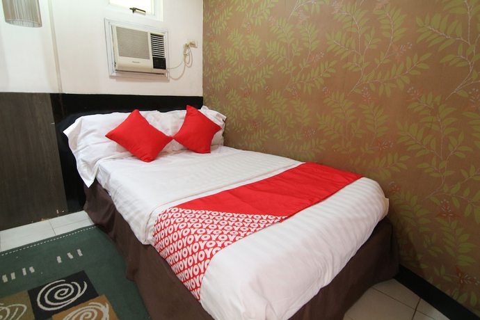 Imagen de la habitación del Hotel Super OYO 107 Orange Nest. Foto 5