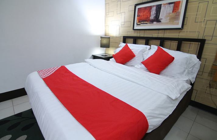 Imagen de la habitación del Hotel Super OYO 107 Orange Nest. Foto 6