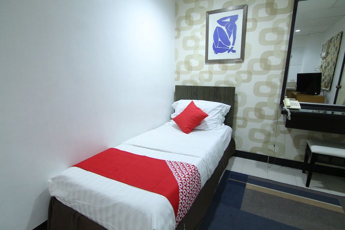 Imagen de la habitación del Hotel Super OYO 107 Orange Nest. Foto 9