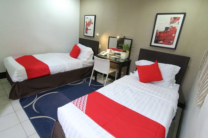 Imagen de la habitación del Hotel Super OYO 107 Orange Nest. Foto 10