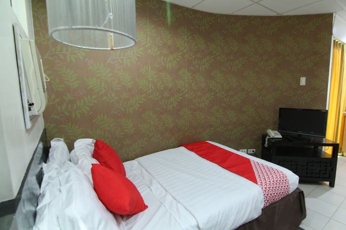 Imagen de la habitación del Hotel Super OYO 107 Orange Nest. Foto 11