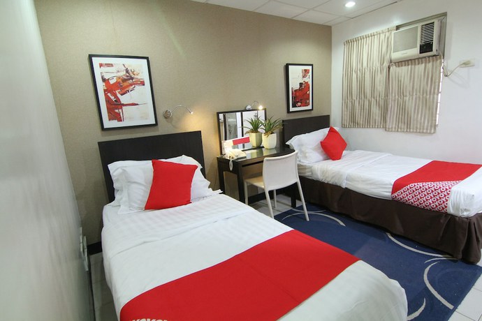 Imagen de la habitación del Hotel Super OYO 107 Orange Nest. Foto 14