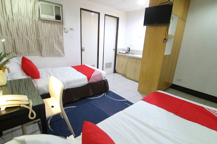 Imagen de la habitación del Hotel Super OYO 107 Orange Nest. Foto 16