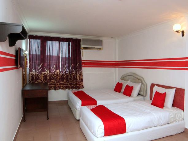 Imagen de la habitación del Hotel Super OYO 1173 Mandyrin. Foto 2