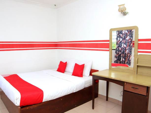 Imagen de la habitación del Hotel Super OYO 1173 Mandyrin. Foto 3
