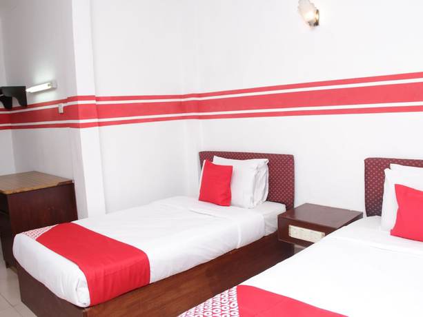 Imagen de la habitación del Hotel Super OYO 1173 Mandyrin. Foto 4