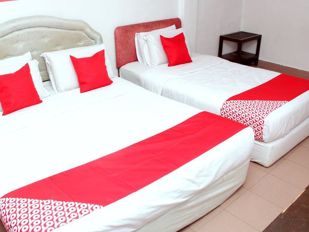 Imagen de la habitación del Hotel Super OYO 1173 Mandyrin. Foto 10