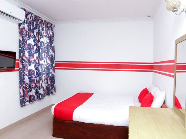 Imagen de la habitación del Hotel Super OYO 1173 Mandyrin. Foto 11