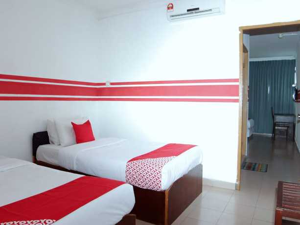 Imagen de la habitación del Hotel Super OYO 1173 Mandyrin. Foto 16