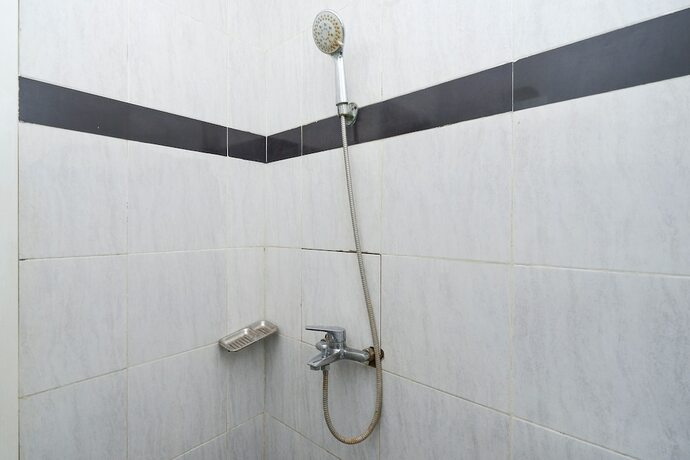 Imagen general del Hotel Super OYO 1250 Unta Residence. Foto 10