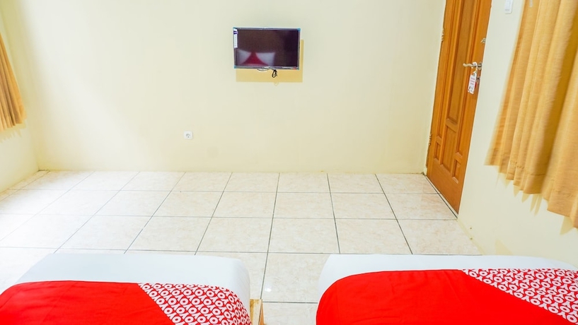 Imagen de la habitación del Hotel Super OYO 1340 Wisma Alamanda. Foto 3