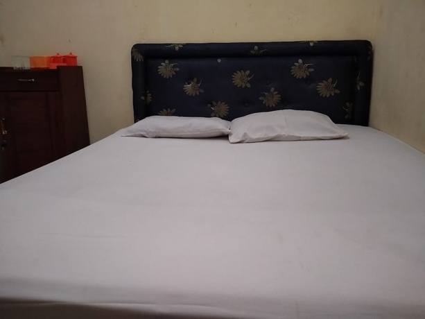 Imagen de la habitación del Hotel Super OYO 1340 Wisma Alamanda. Foto 5
