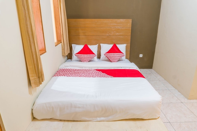 Imagen de la habitación del Hotel Super OYO 1340 Wisma Alamanda. Foto 6