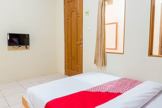 Imagen de la habitación del Hotel Super OYO 1340 Wisma Alamanda. Foto 10