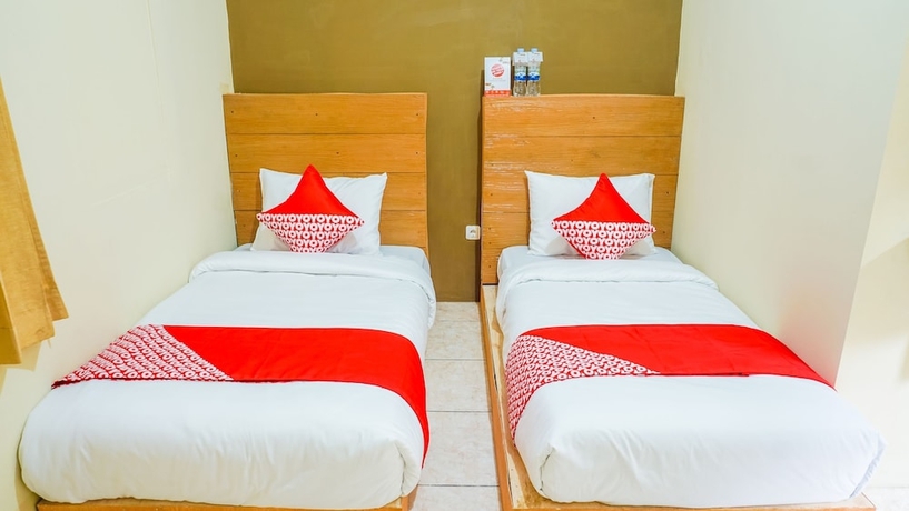 Imagen de la habitación del Hotel Super OYO 1340 Wisma Alamanda. Foto 14