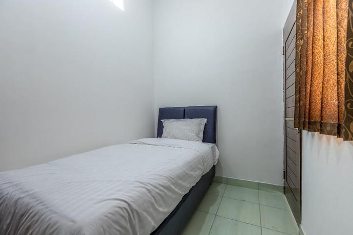Imagen de la habitación del Hotel Super OYO 1487 Residence Khoe. Foto 2