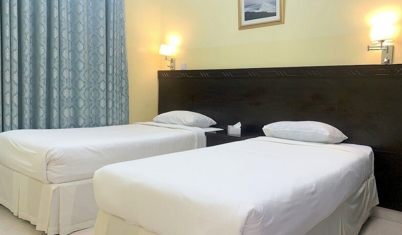 Imagen de la habitación del Hotel Super OYO 152 Manam 1 Apartment. Foto 6
