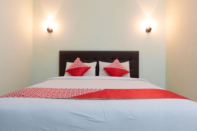 Imagen de la habitación del Hotel Super OYO 1682 Greenia. Foto 4