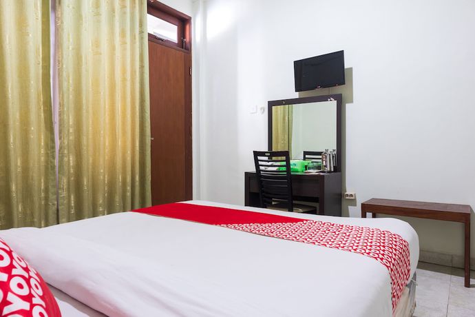 Imagen de la habitación del Hotel Super OYO 1682 Greenia. Foto 5