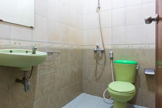 Imagen de la habitación del Hotel Super OYO 1682 Greenia. Foto 6