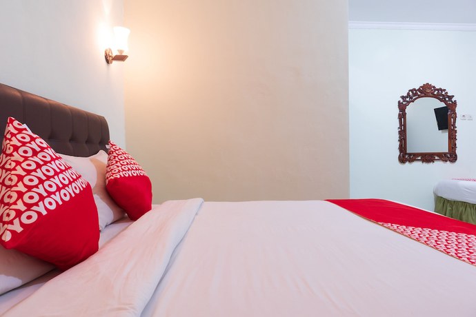 Imagen de la habitación del Hotel Super OYO 1682 Greenia. Foto 7