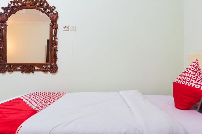 Imagen de la habitación del Hotel Super OYO 1682 Greenia. Foto 9