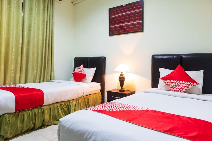 Imagen de la habitación del Hotel Super OYO 1682 Greenia. Foto 13