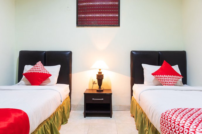 Imagen de la habitación del Hotel Super OYO 1682 Greenia. Foto 14