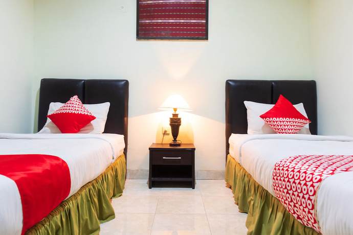 Imagen de la habitación del Hotel Super OYO 1682 Greenia. Foto 15