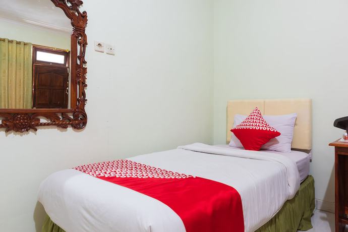 Imagen de la habitación del Hotel Super OYO 1682 Greenia. Foto 16