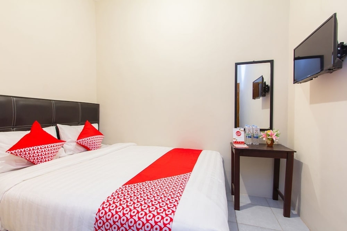 Imagen de la habitación del Hotel Super OYO 1718 Homestay Wak Gobenk. Foto 2