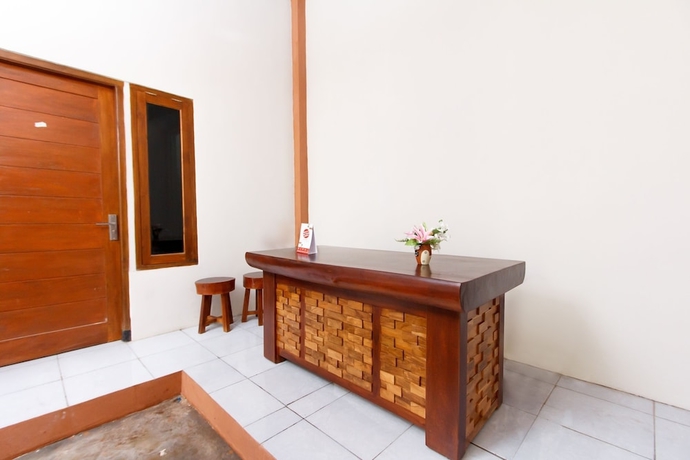 Imagen de los interiores del Hotel Super OYO 1718 Homestay Wak Gobenk. Foto 11