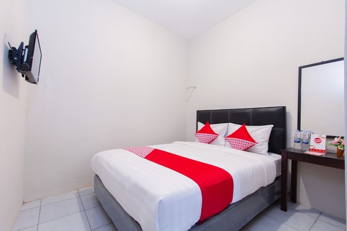 Imagen de la habitación del Hotel Super OYO 1718 Homestay Wak Gobenk. Foto 3