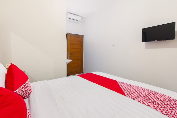 Imagen de la habitación del Hotel Super OYO 1718 Homestay Wak Gobenk. Foto 6