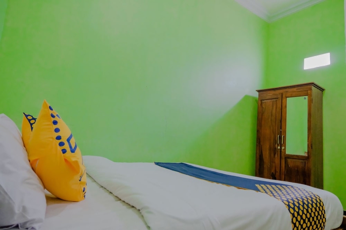 Imagen de la habitación del Hotel Super OYO 1759 Family Residence Syariah. Foto 9