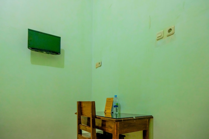 Imagen de la habitación del Hotel Super OYO 1759 Family Residence Syariah. Foto 13