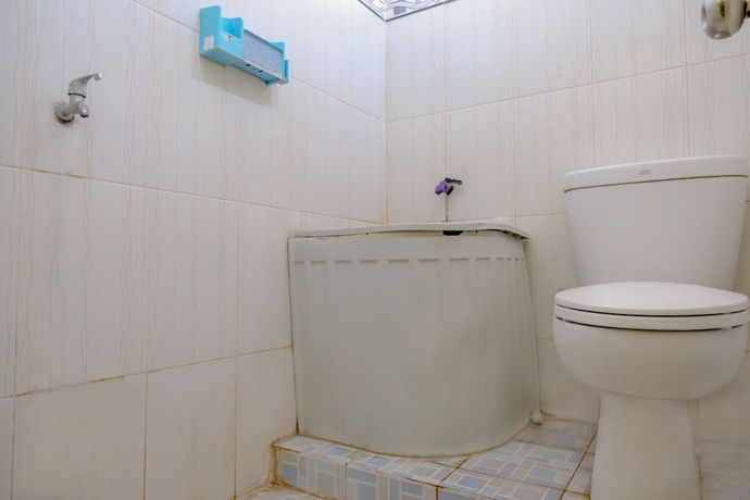 Imagen de la habitación del Hotel Super OYO 1759 Family Residence Syariah. Foto 14