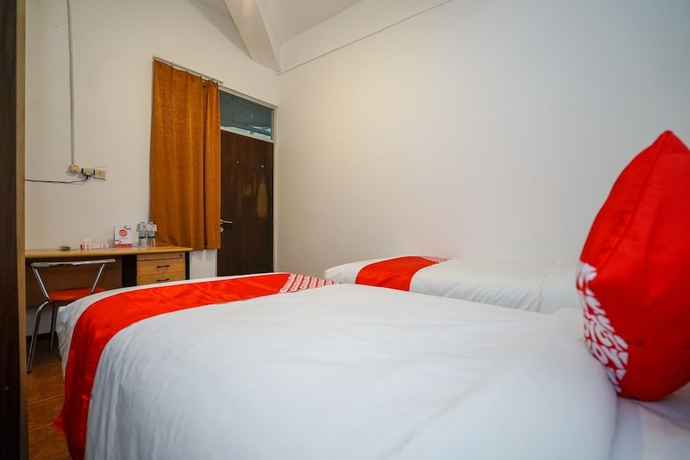 Imagen de la habitación del Hotel Super OYO 1844 Bravo Residence. Foto 3