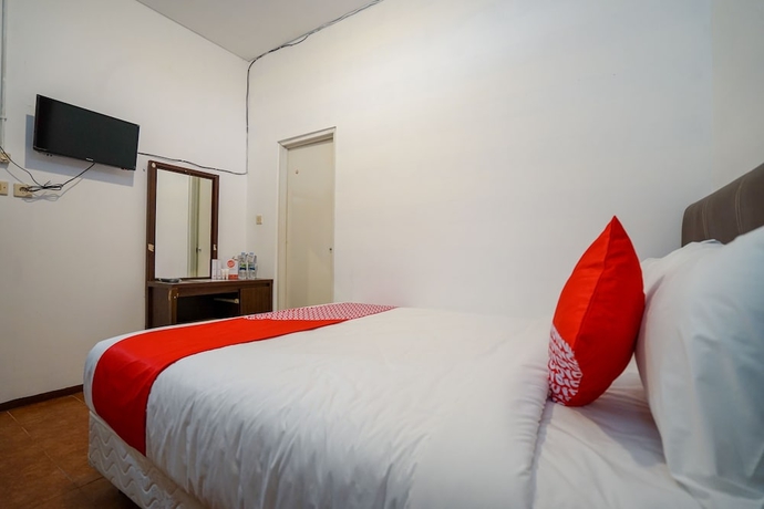 Imagen de la habitación del Hotel Super OYO 1844 Bravo Residence. Foto 4