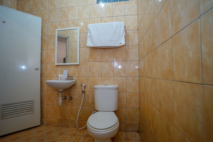 Imagen de la habitación del Hotel Super OYO 1844 Bravo Residence. Foto 12