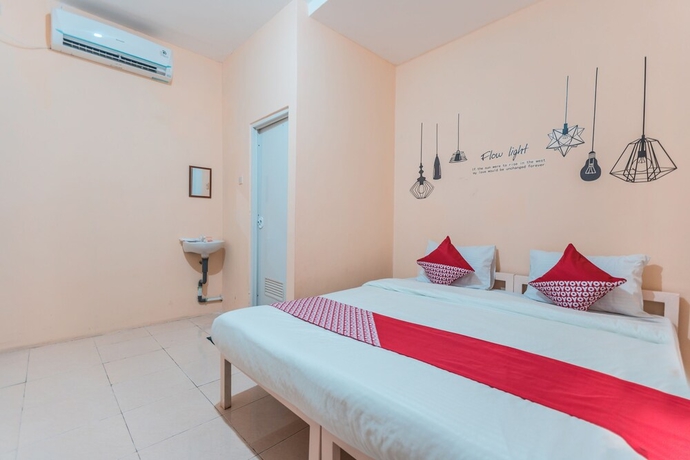 Imagen de la habitación del Hotel Super OYO 2034 Eden Guest House. Foto 5