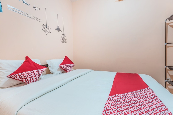 Imagen de la habitación del Hotel Super OYO 2034 Eden Guest House. Foto 7