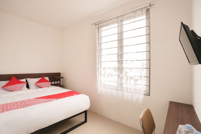 Imagen de la habitación del Hotel Super OYO 2183 Cibeureum Residence. Foto 8