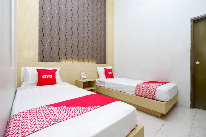 Imagen de la habitación del Hotel Super OYO 2436 Hotel Kencana. Foto 1