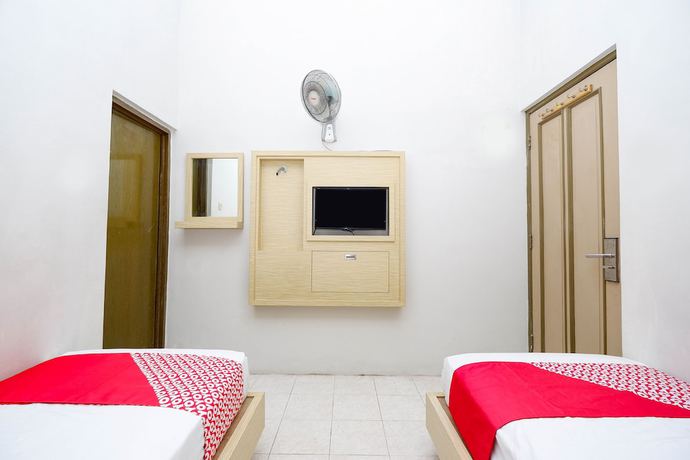 Imagen de la habitación del Hotel Super OYO 2436 Hotel Kencana. Foto 4