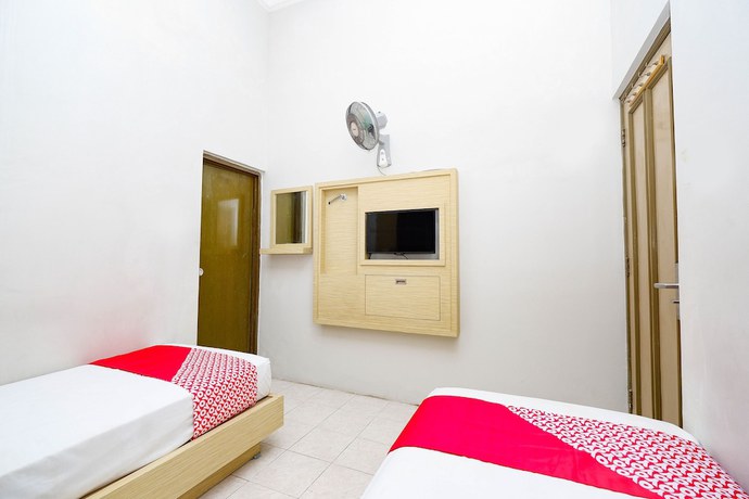 Imagen de la habitación del Hotel Super OYO 2436 Hotel Kencana. Foto 11