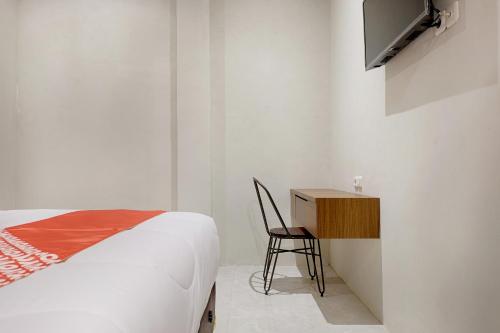 Imagen de la habitación del Hotel Super OYO 2756 Anata. Foto 17