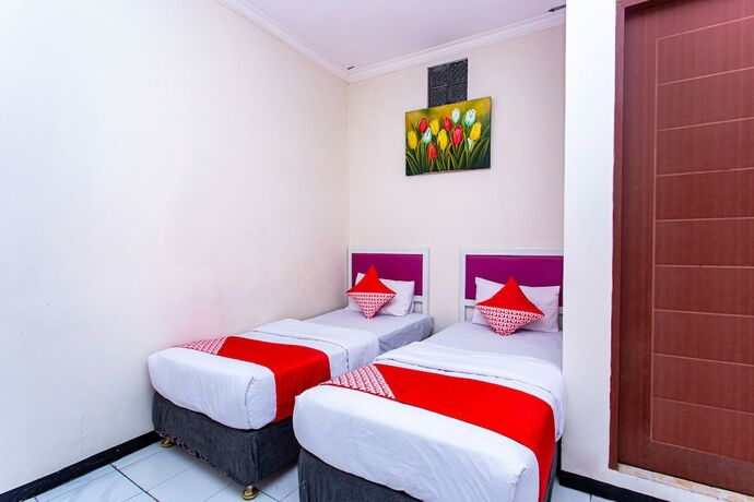 Imagen de la habitación del Hotel Super OYO 3042 Griya Karangsalam Indah. Foto 17