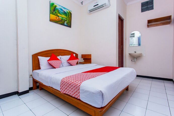 Imagen de la habitación del Hotel Super OYO 3042 Griya Karangsalam Indah. Foto 20